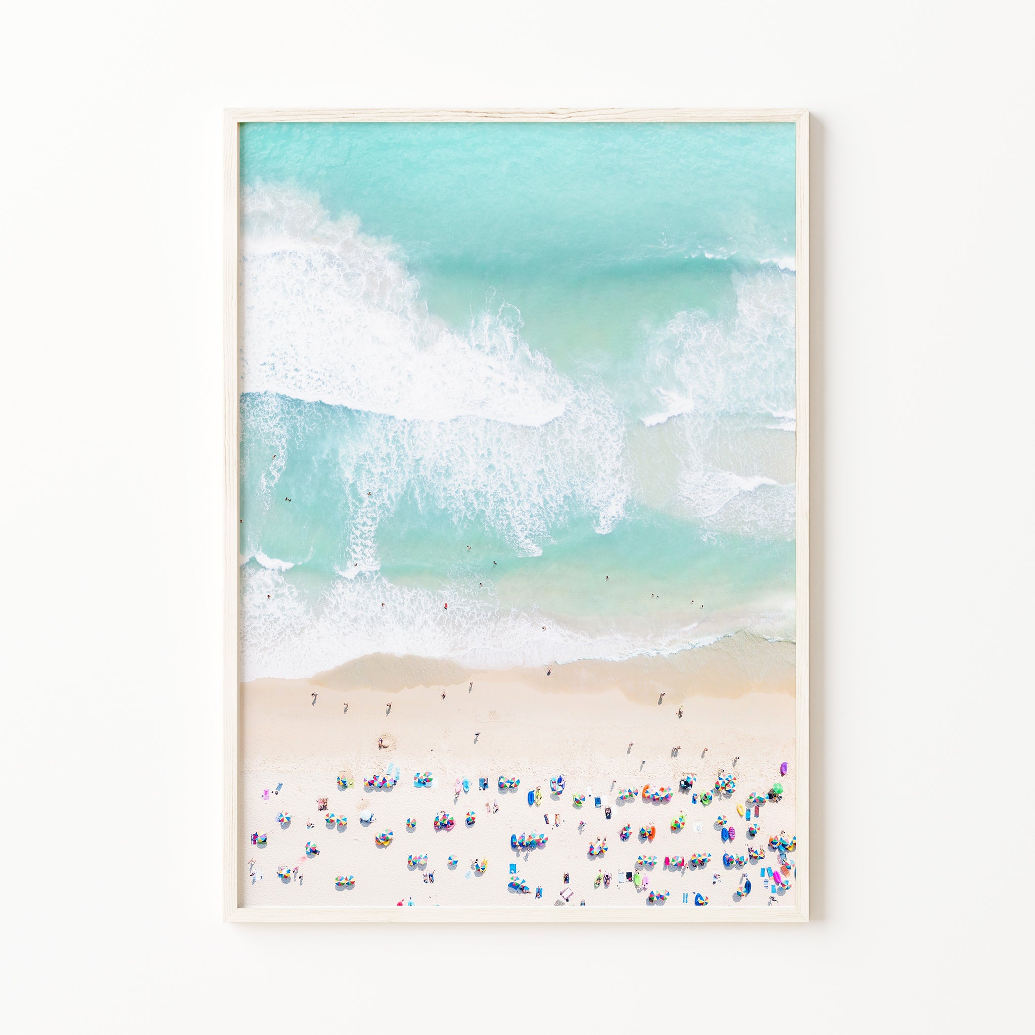 Aerial ocean print with soft pastel turquoise waves and sandy beach, people and umbrellas, summer print, neutral minimalist coastal wall art decor, large